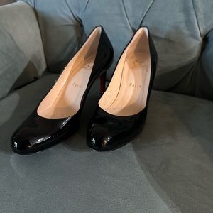 Christian Louboutin patent leather pumps